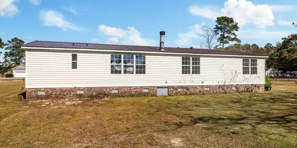 Image 2: Back of home