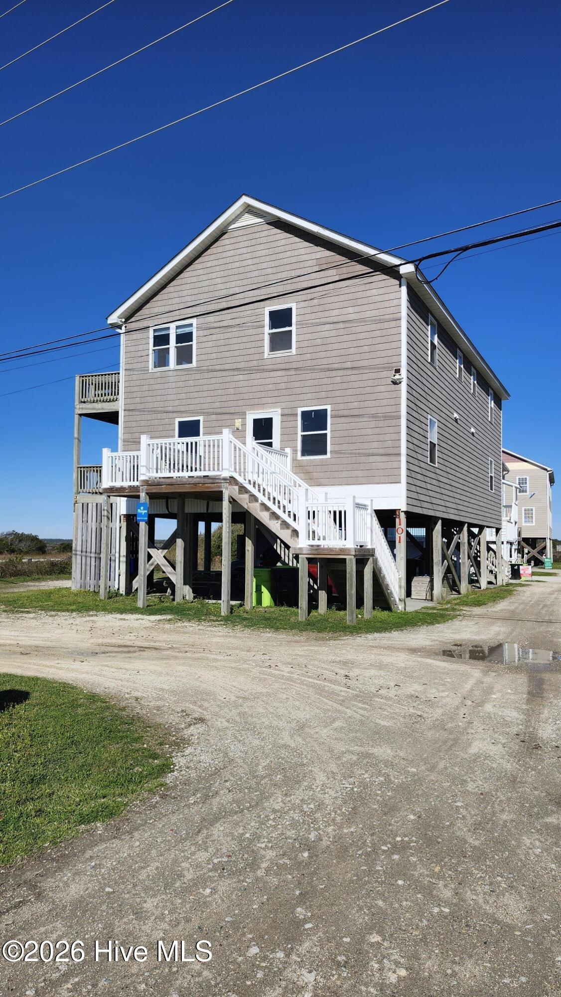 Image 3: Front of house and stairs to front door