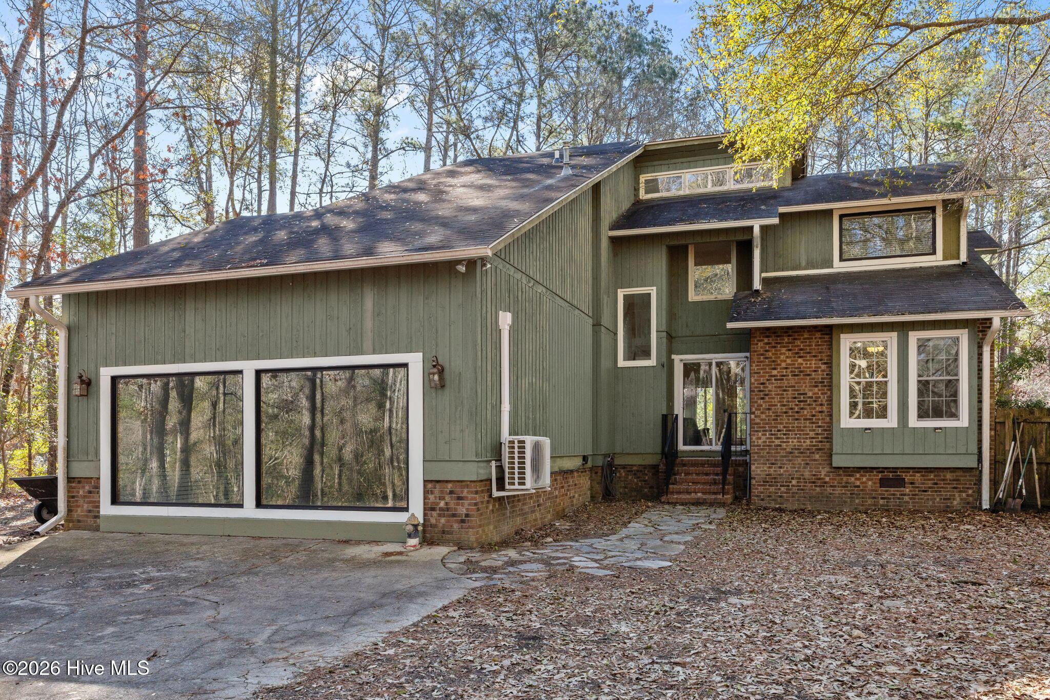 Image 2: Back of home