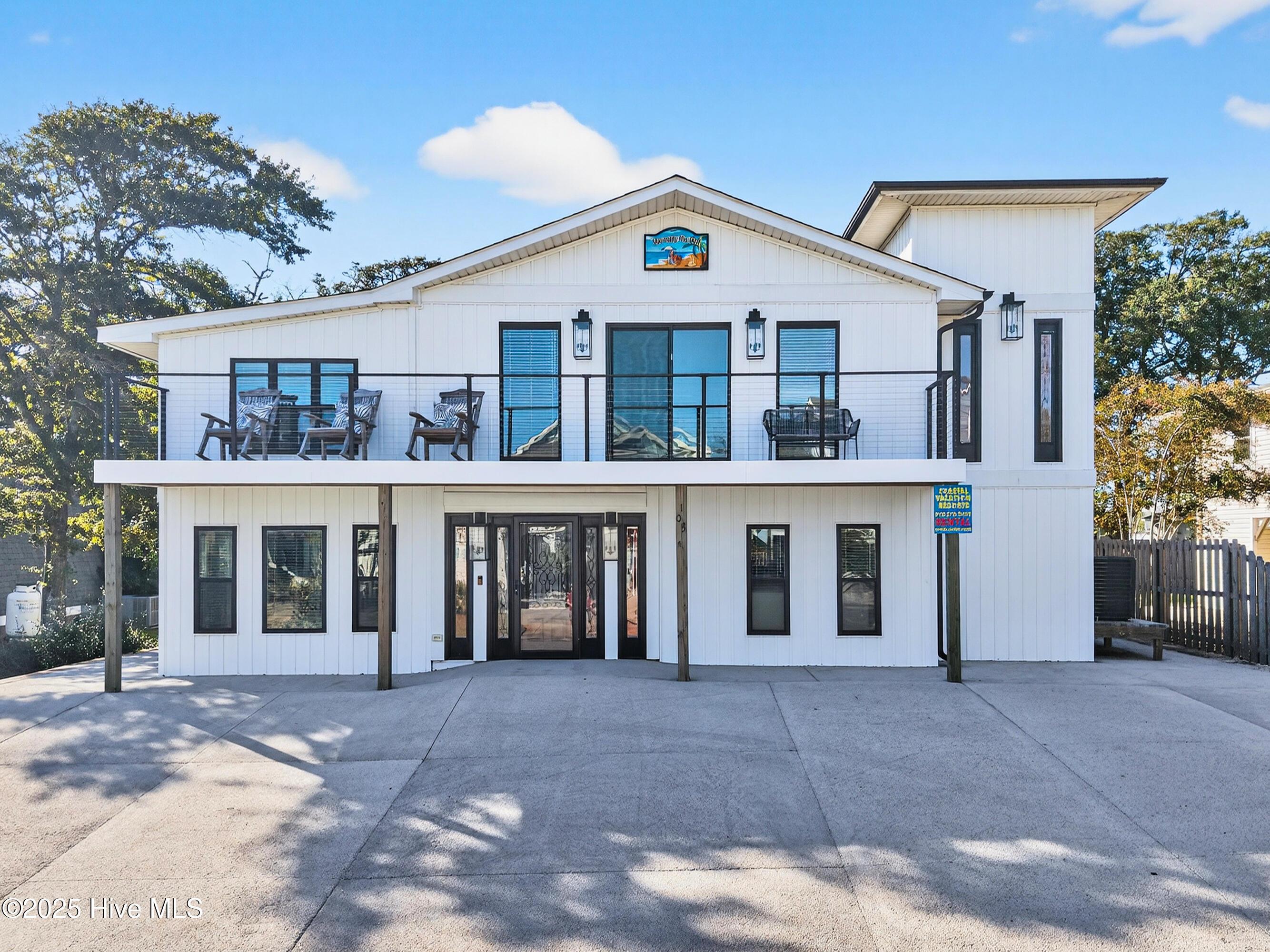 Image 3: 105 SE Front View of 53rd Street