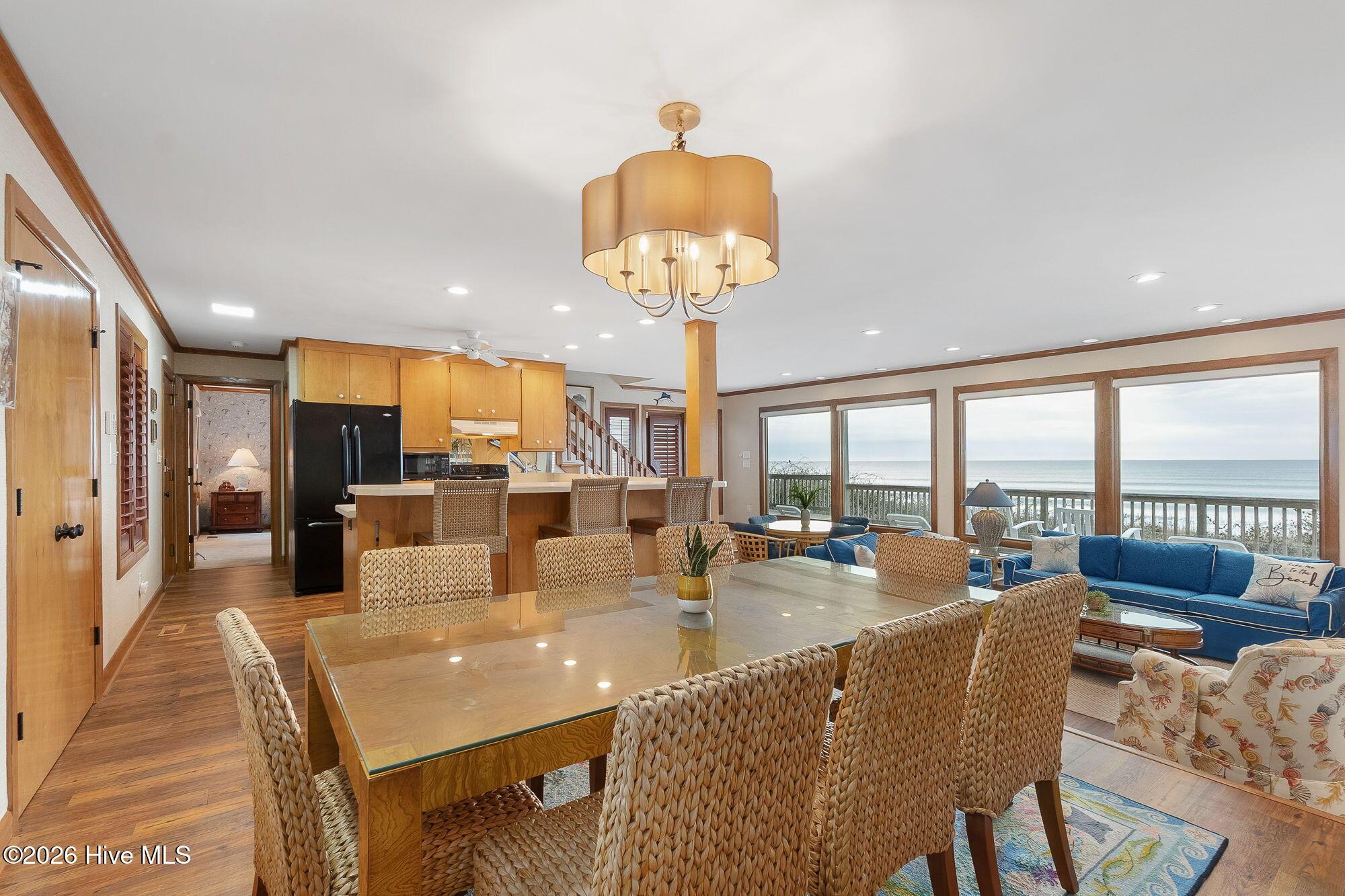 Image 4: Open concept kitchen and dining