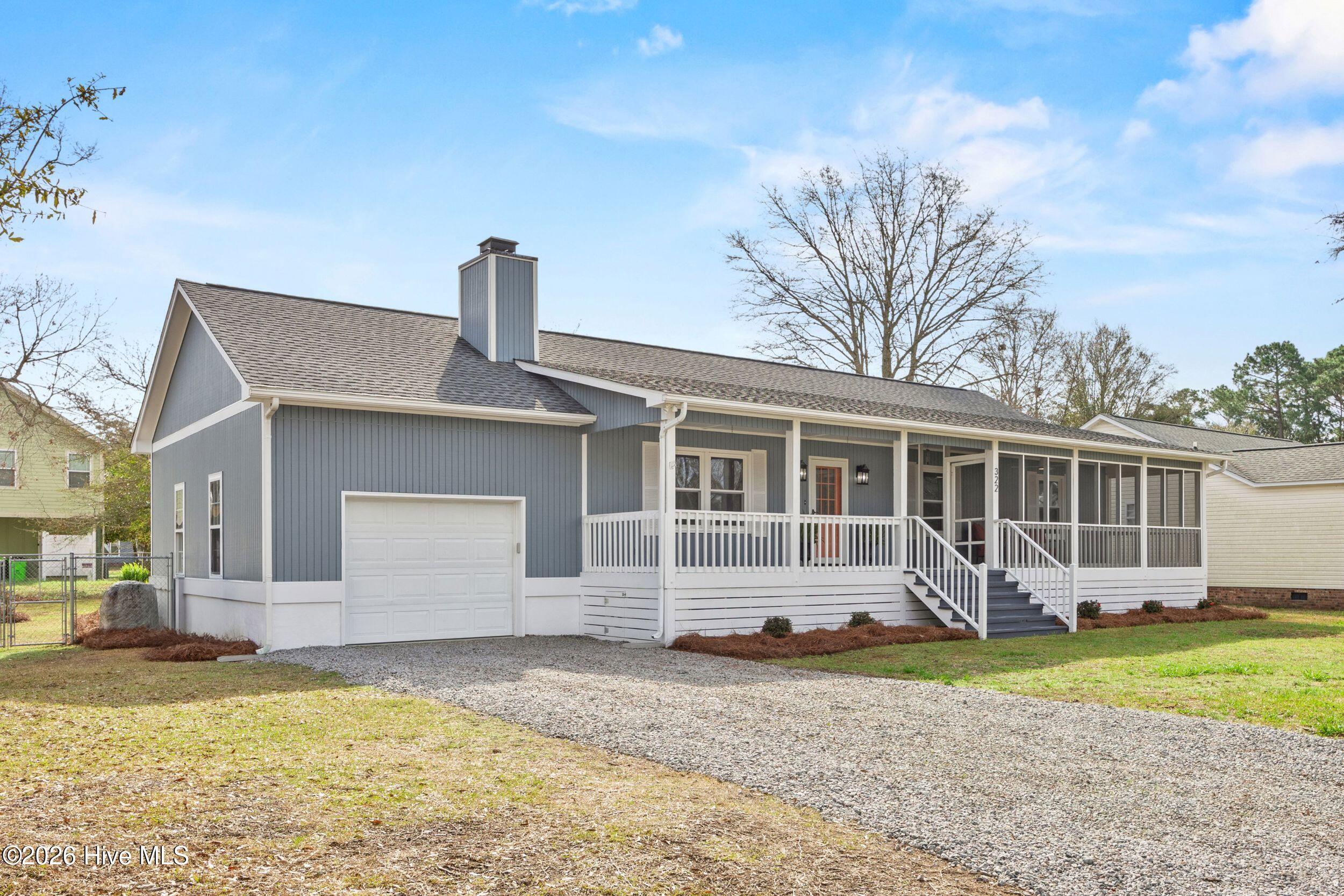 Image 4: Front with Garage