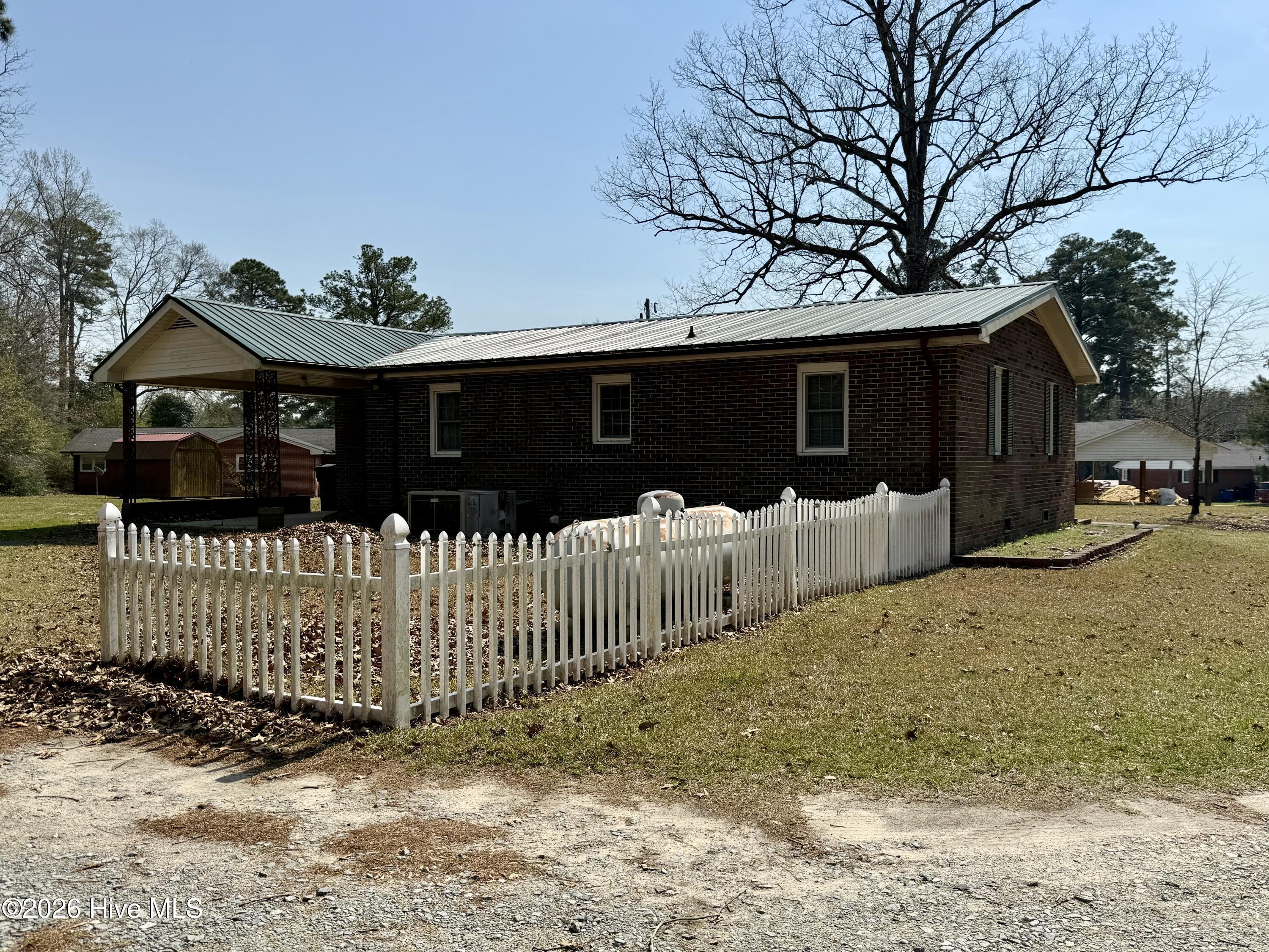 Image 4: Back of home