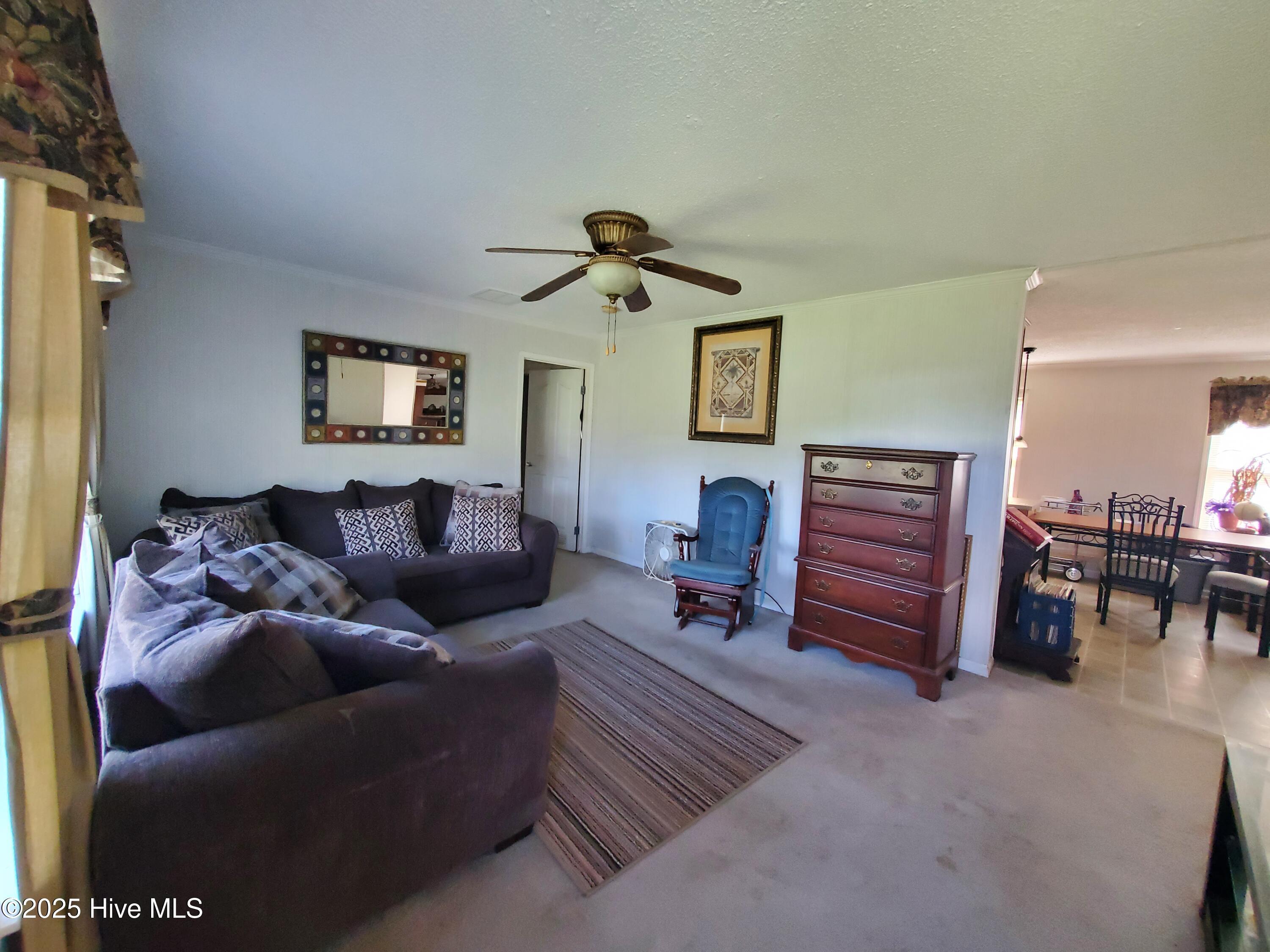 Image 3: Main entry living room