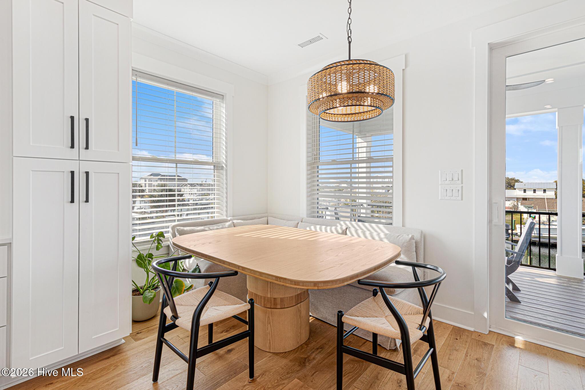 Image 4: Dining Area with Water Views