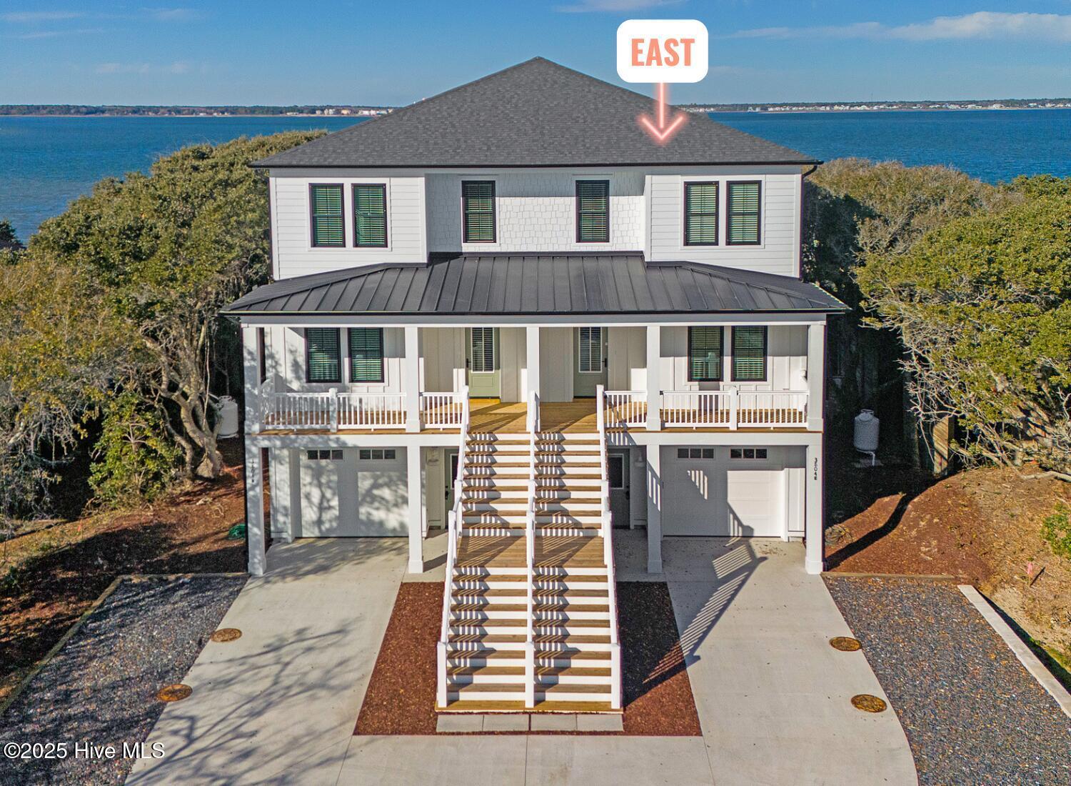 Image 1: New construction duplex on the sound