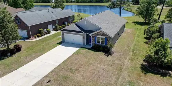 Image 2: 2021 Caracara Dr. with pond view