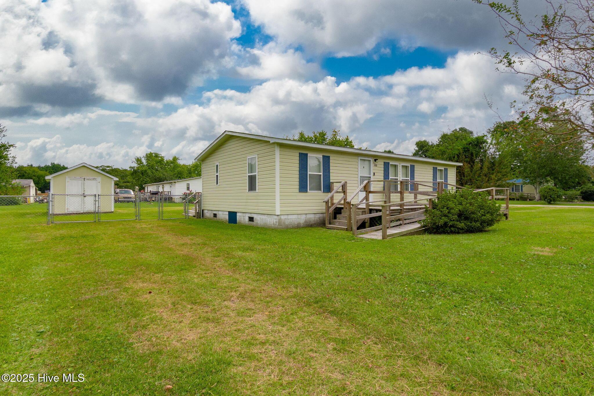 Image 3: Front of Home and Storage