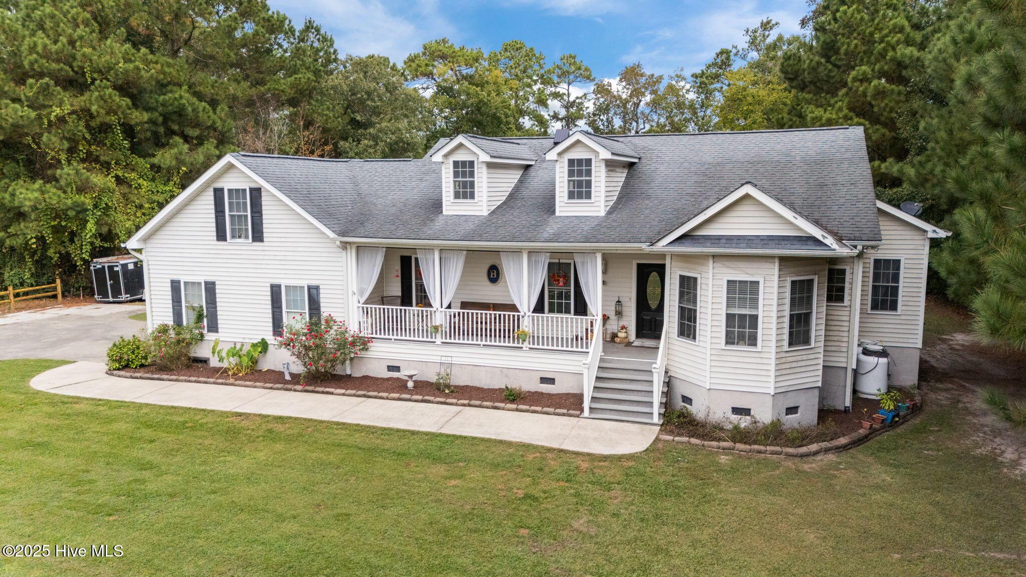 Image 3: front of house 2