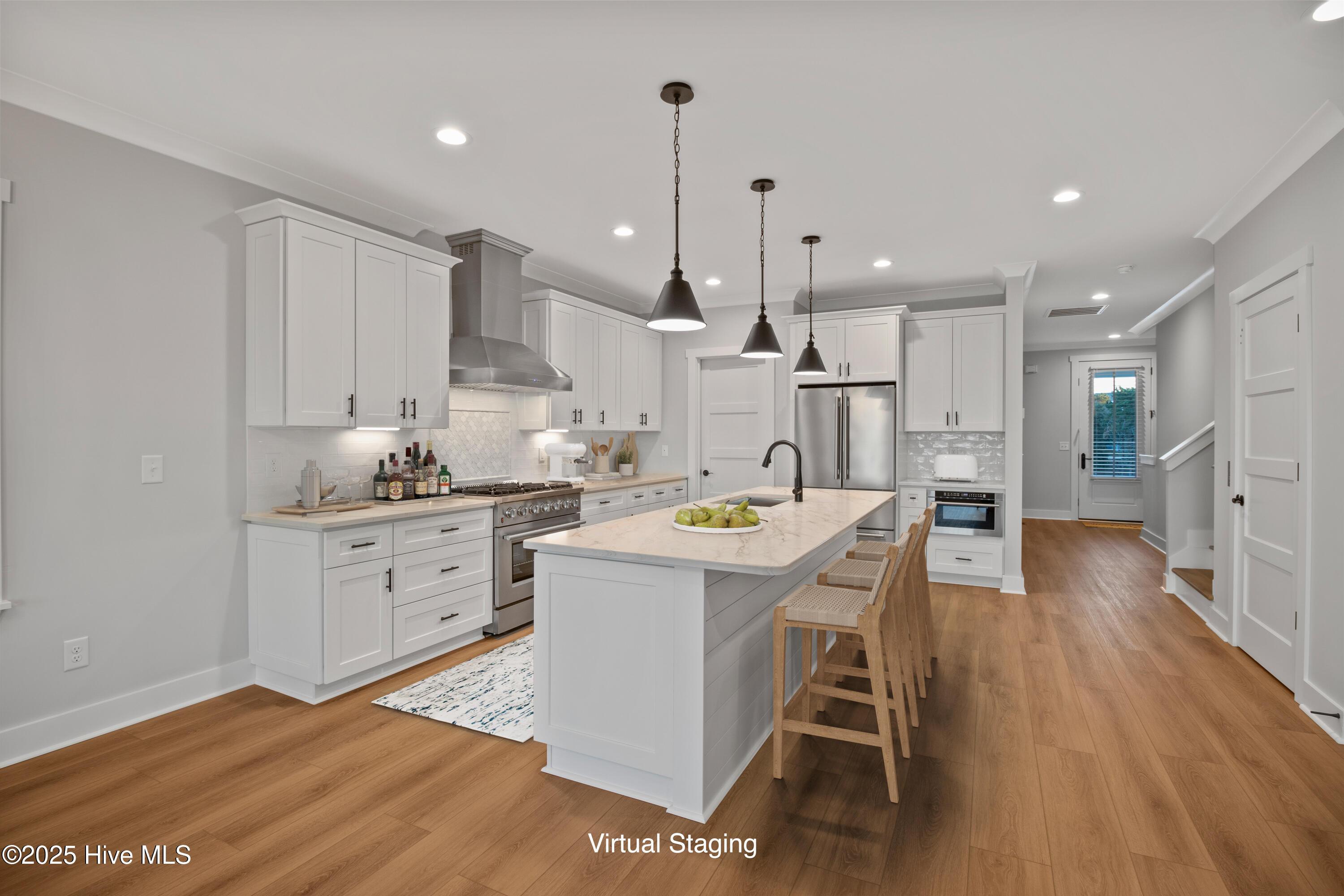 Image 2: Kitchen Open to Living Room