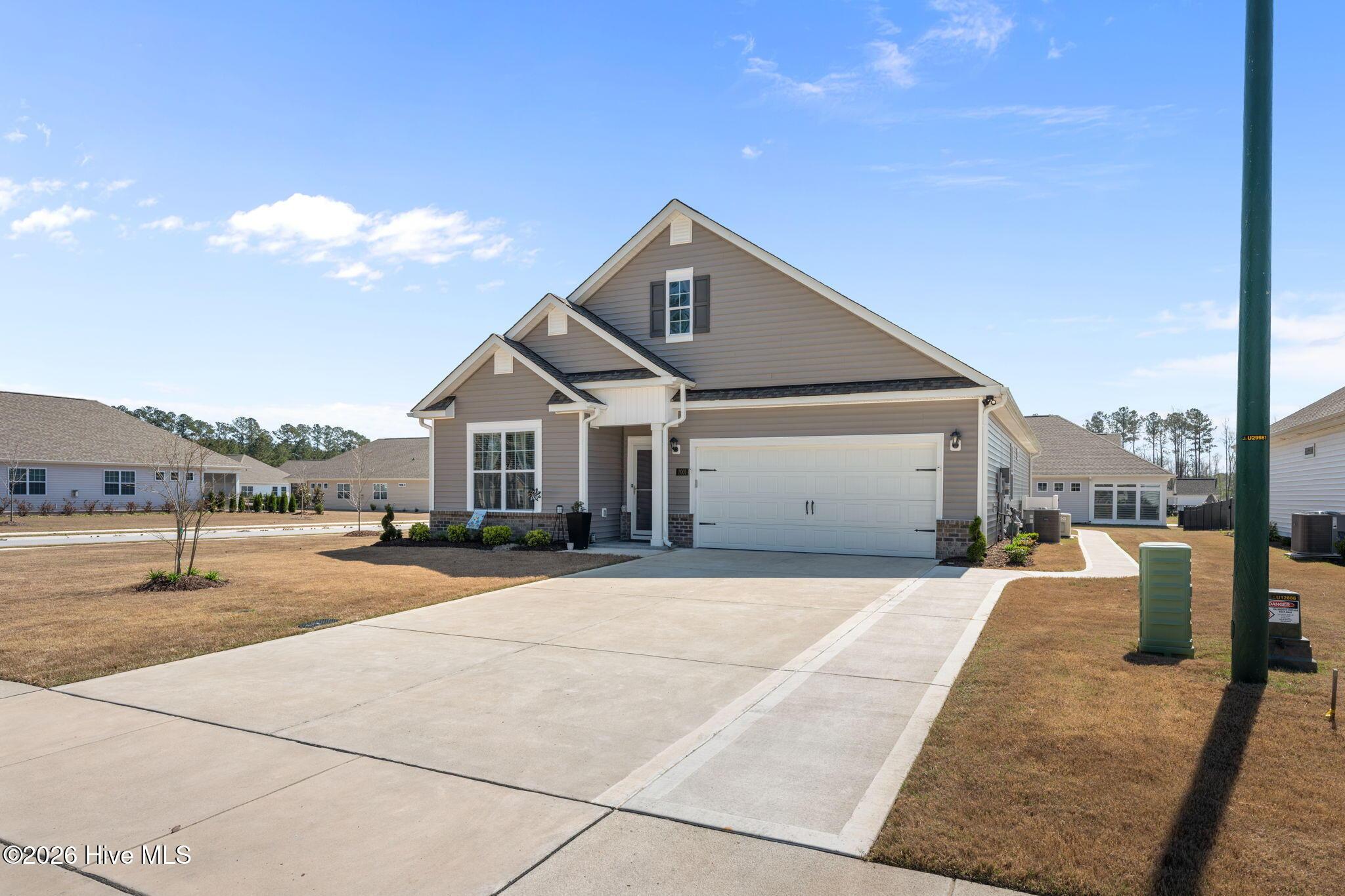 Image 2: Side front view of home