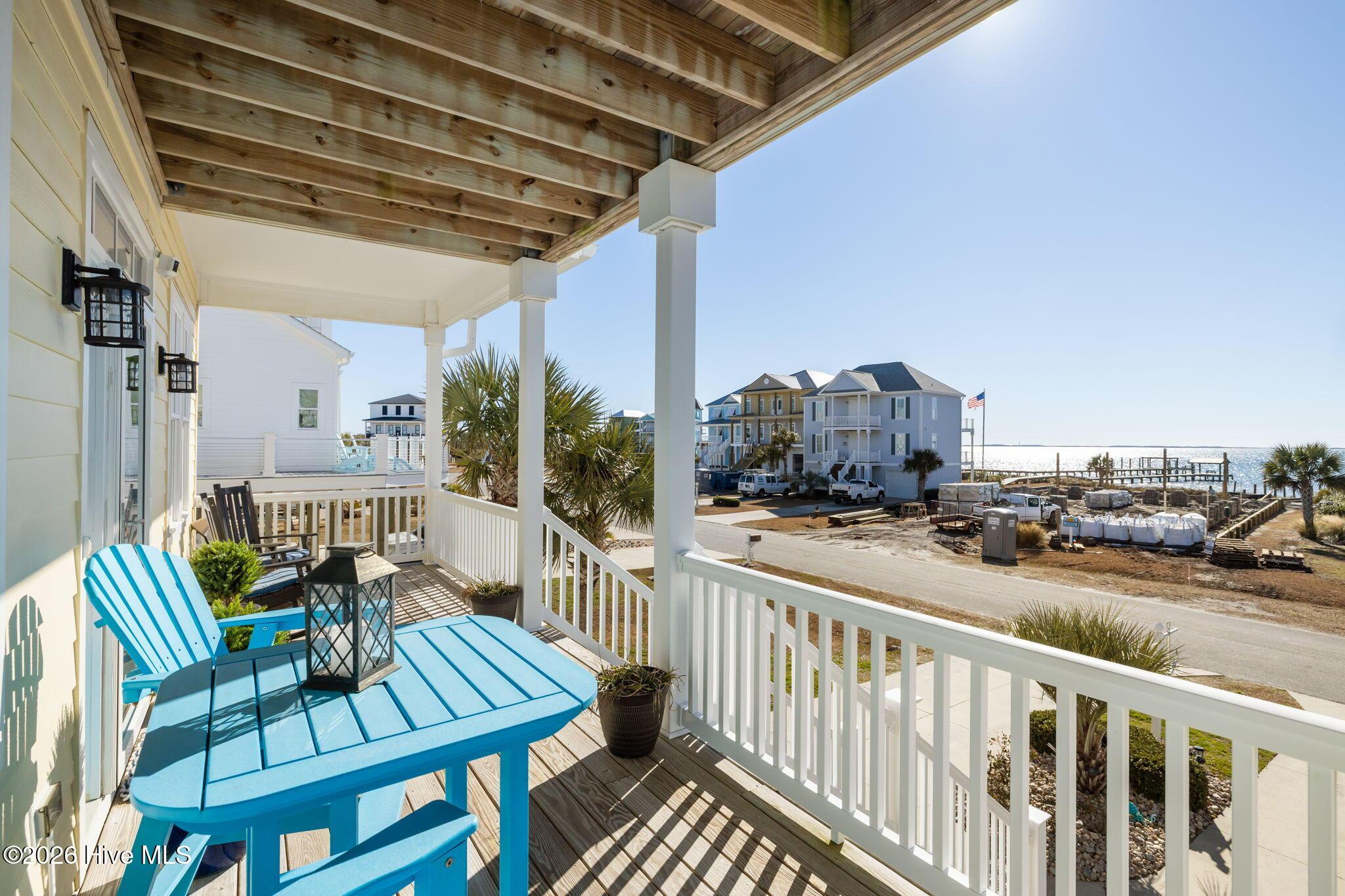 Image 3: Covered Front Porch with Waterviews