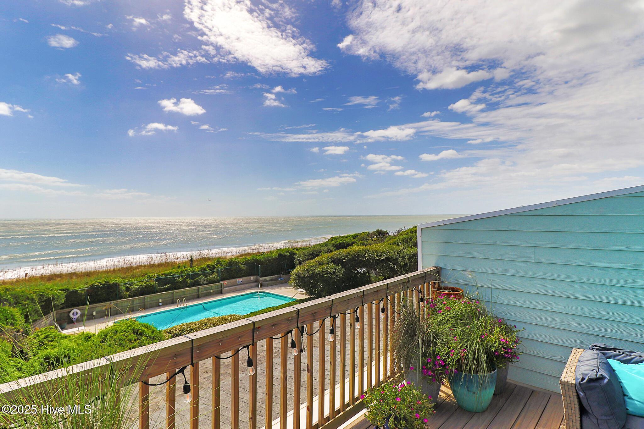 Image 4: Deck overviewing Pool and Ocean