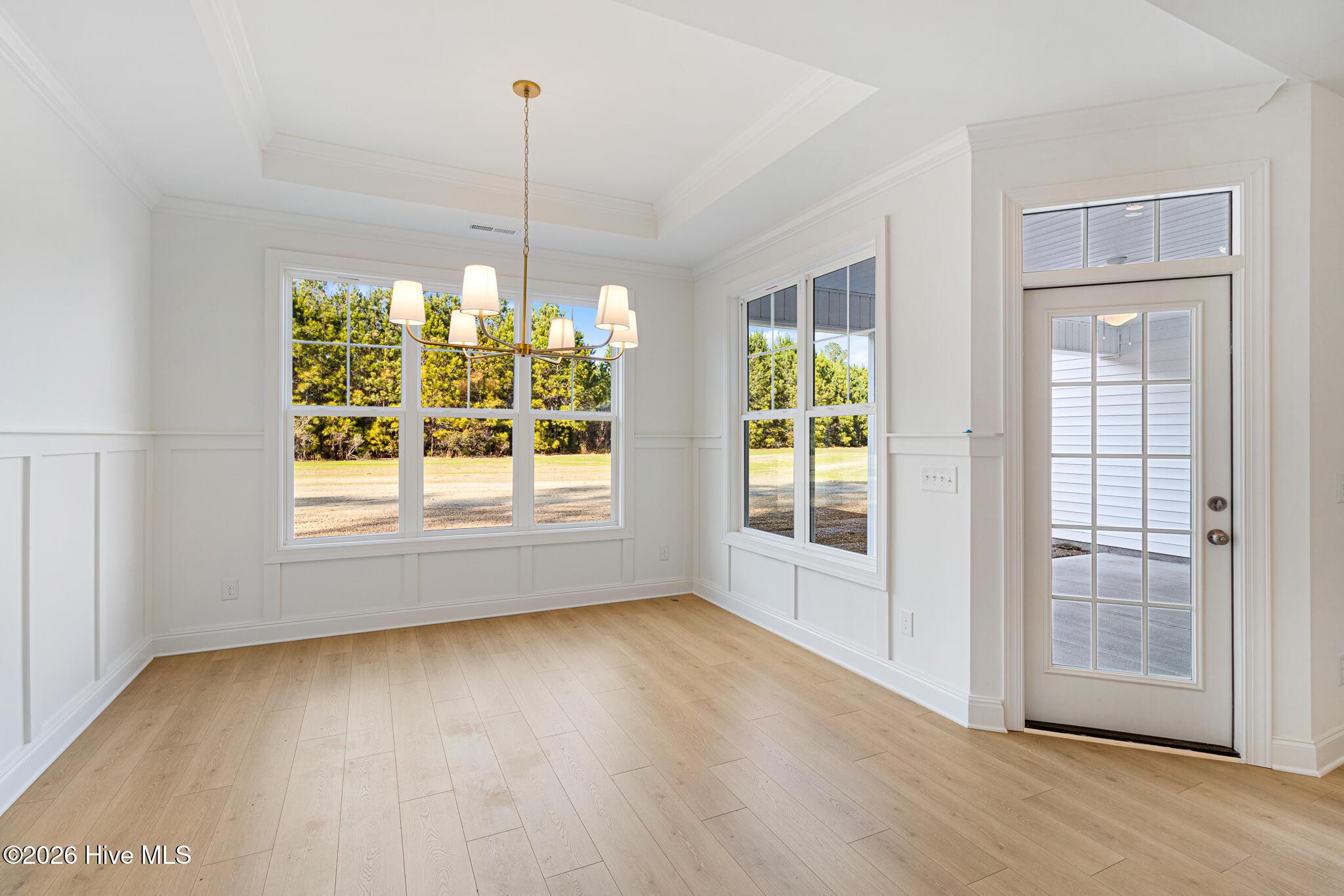 Image 3: Dining Area Open to Kitchen