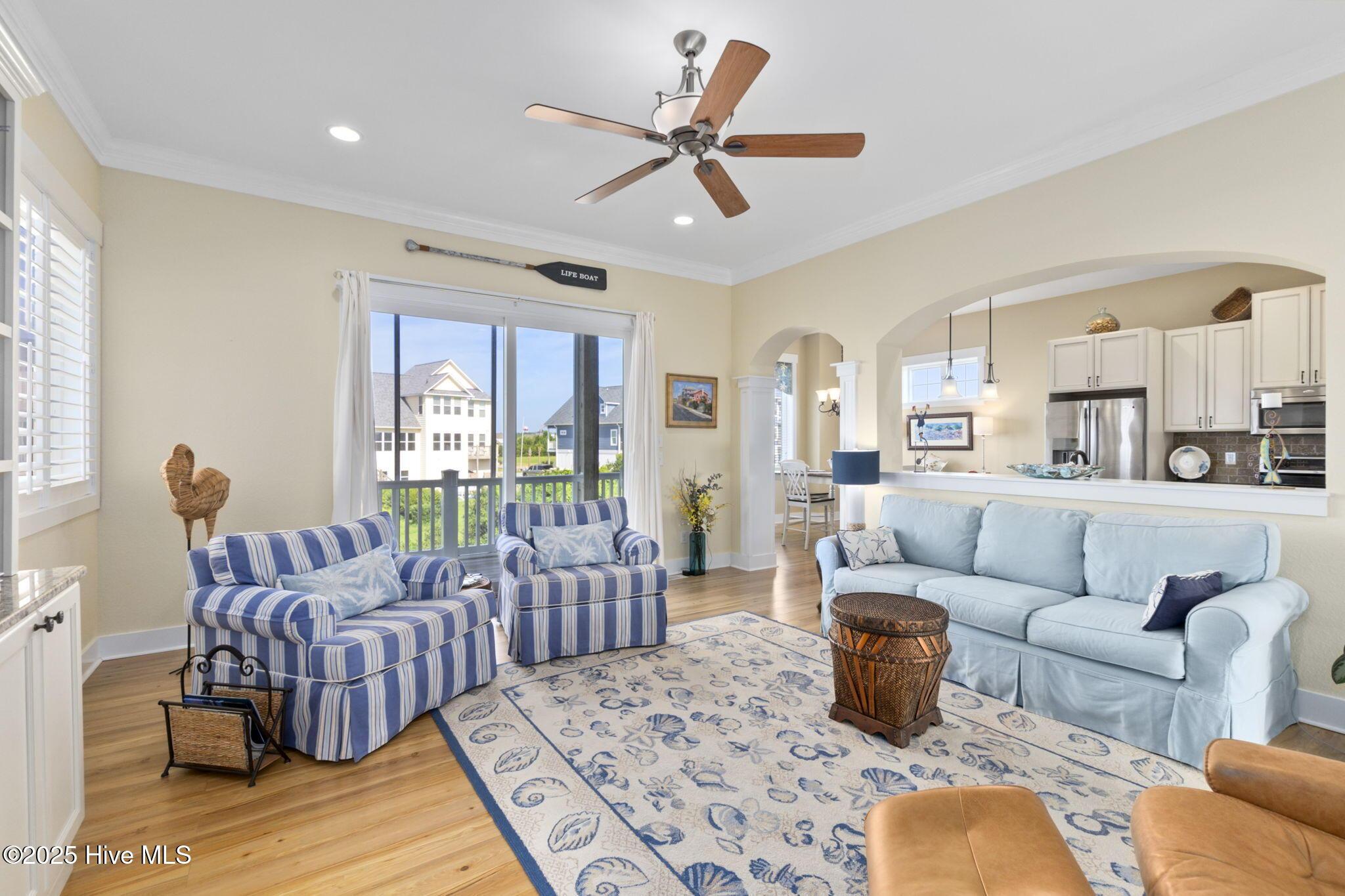 Image 4: Living room with screened porch access