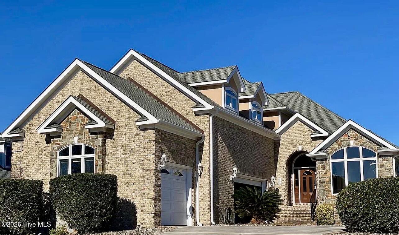 Image 4: Side with Garages