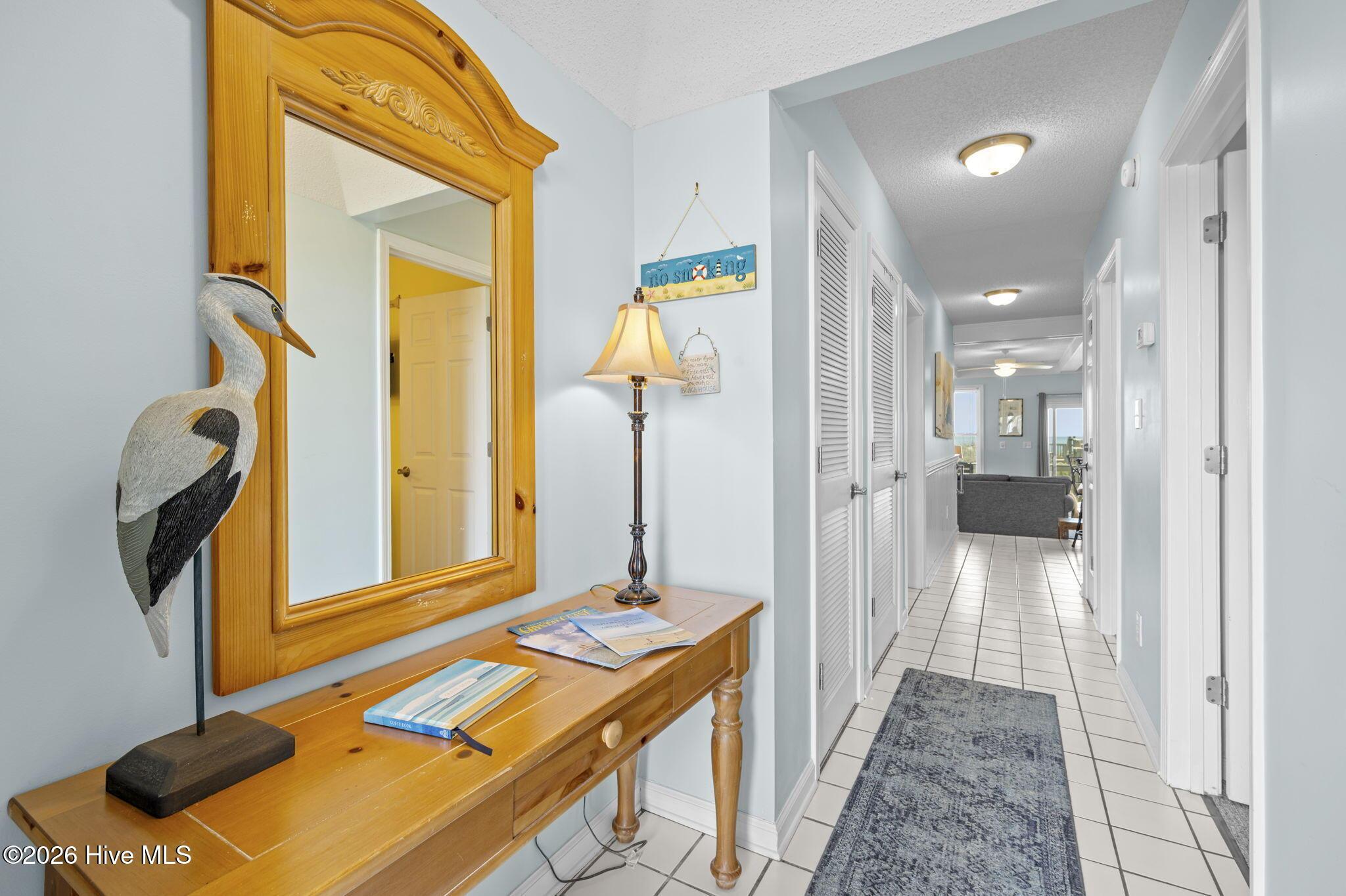 Image 4: Hallway to Kitchen and Living Area