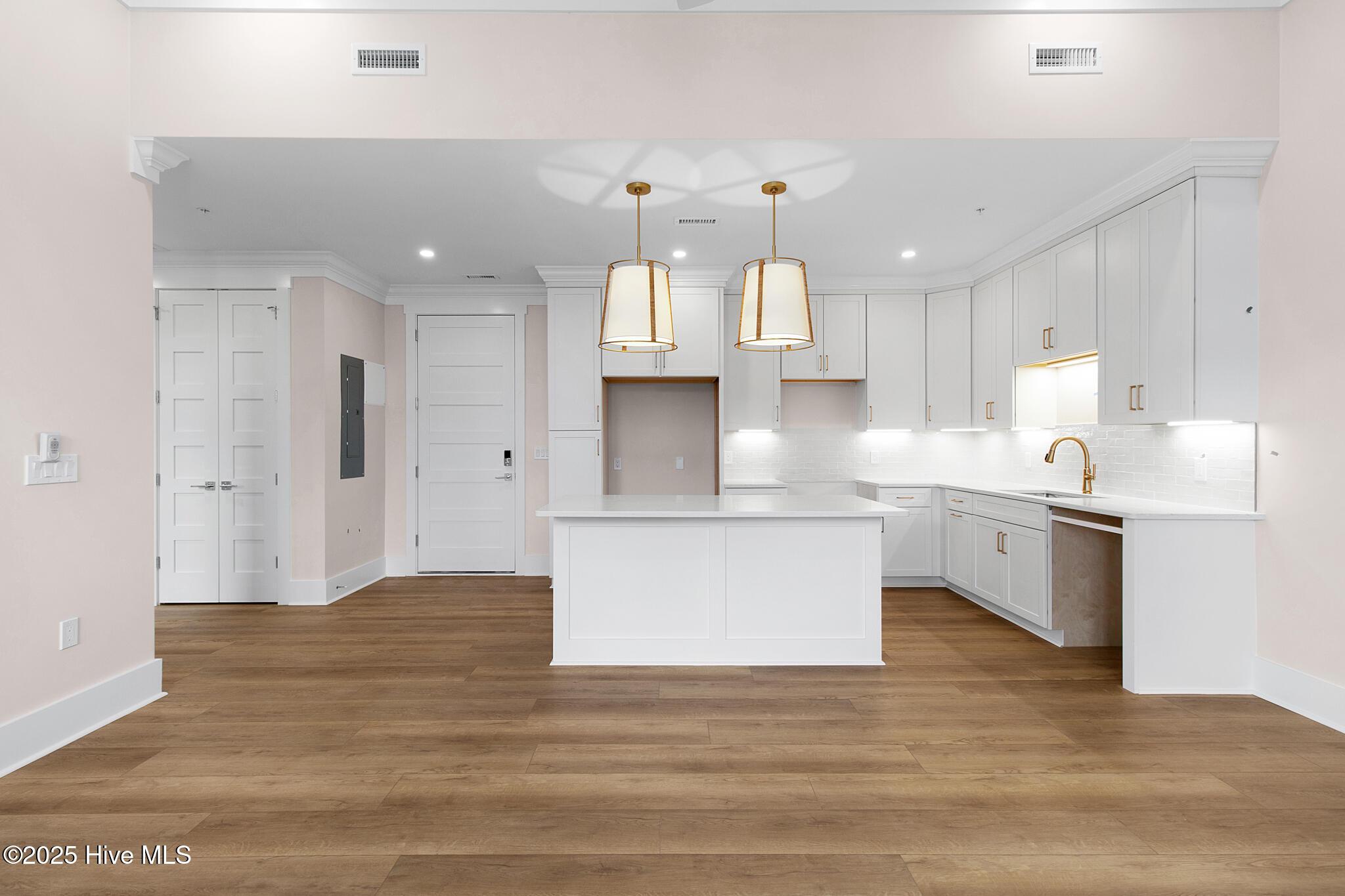 Image 1: Open Living, Kitchen, and Dining