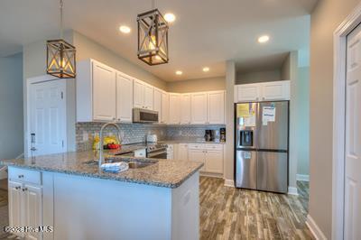 Image 3: 5103 W Beach Drive 2