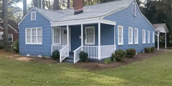 Image 4: 1306 N Respess Street - side view b