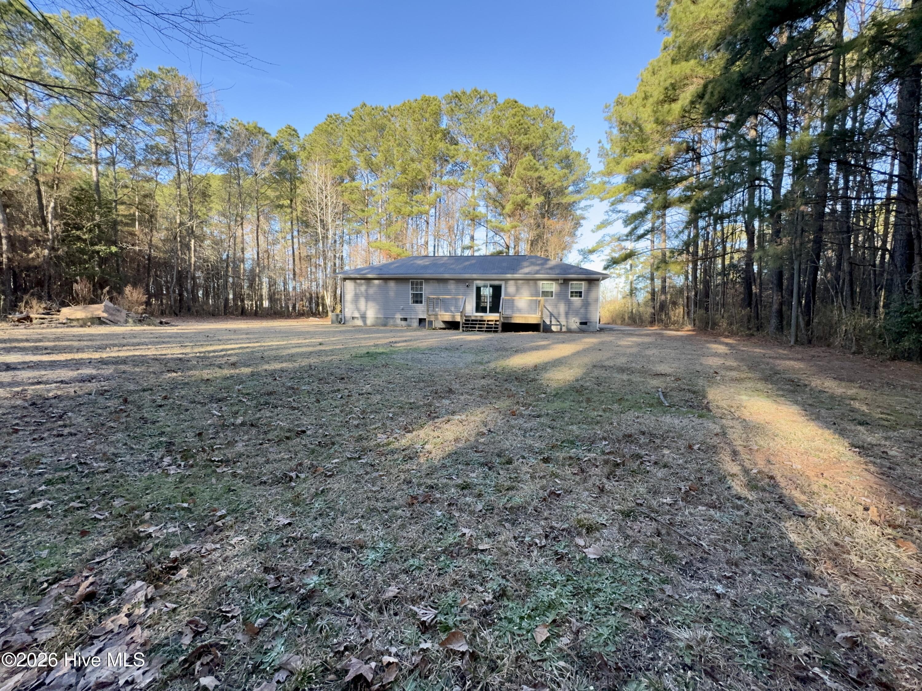 Image 1: Large clear, level yard