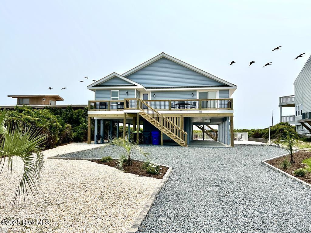 Image 1: 323 Caswell Beach