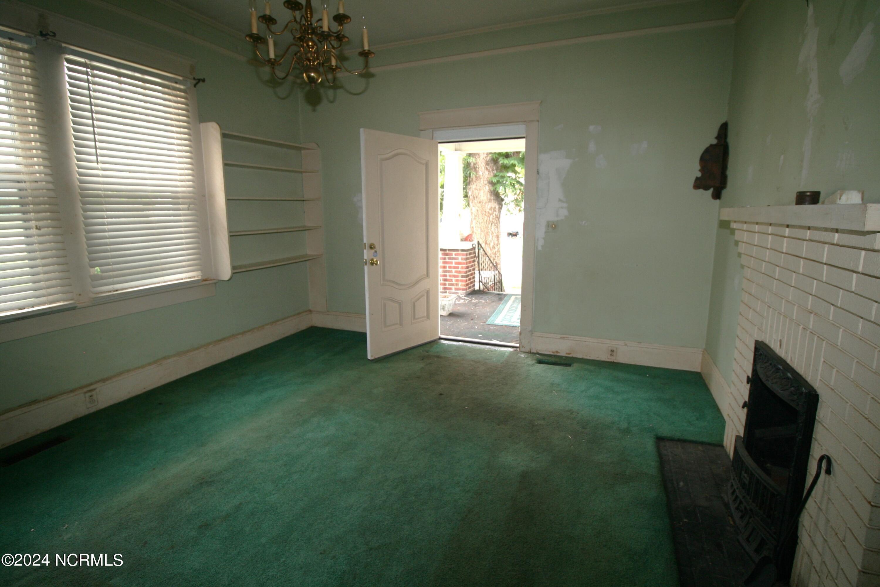 Image 3: Living Room View to Front Porch