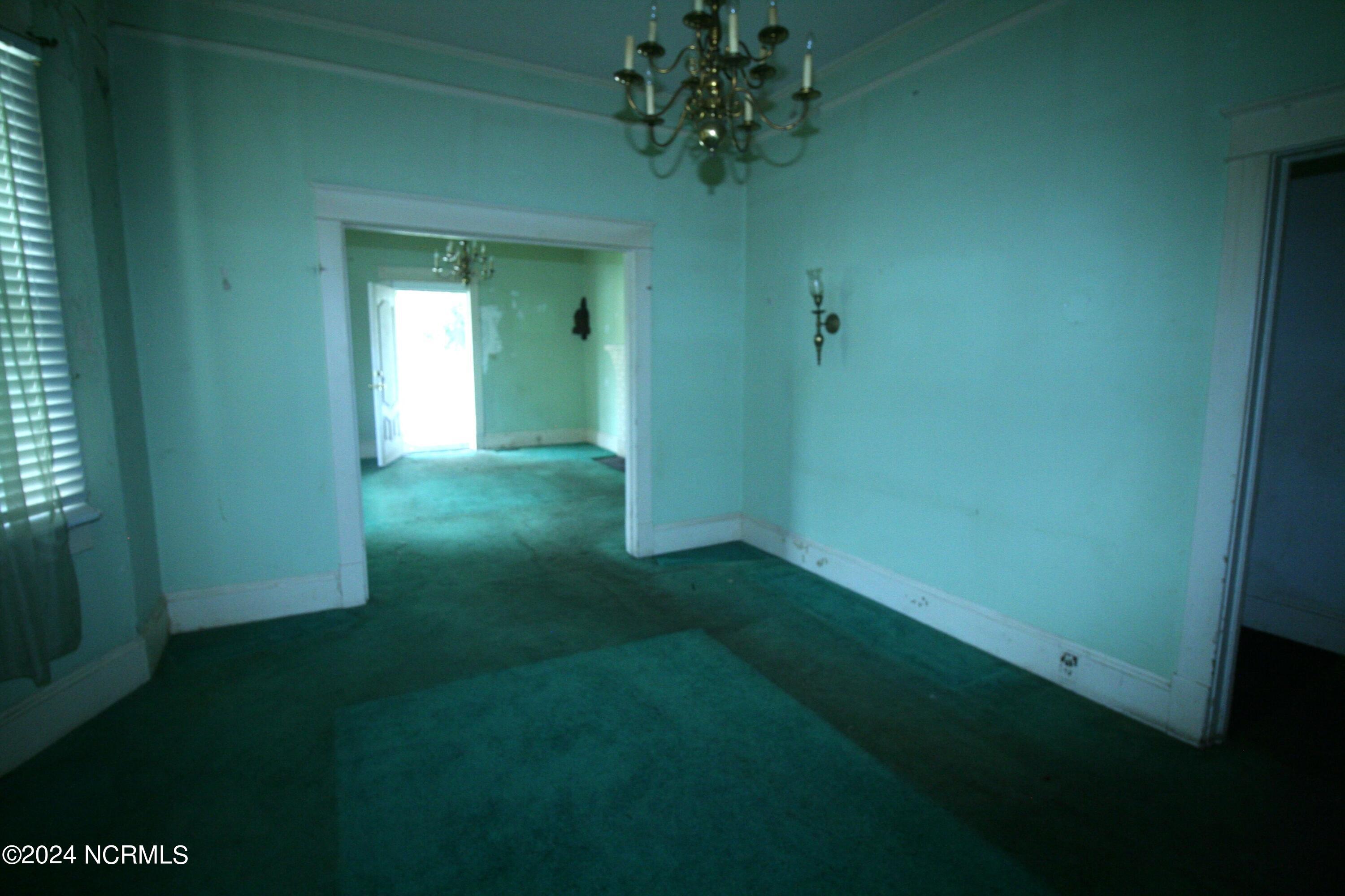 Image 4: Dining Room View into Living Room