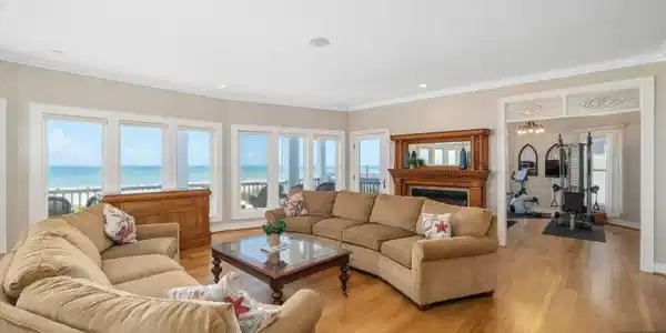 Image 4: Open living room w/ fireplace