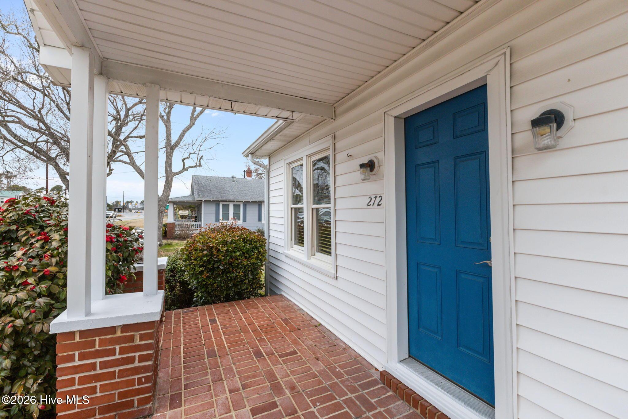 Image 2: Front Porch looking West