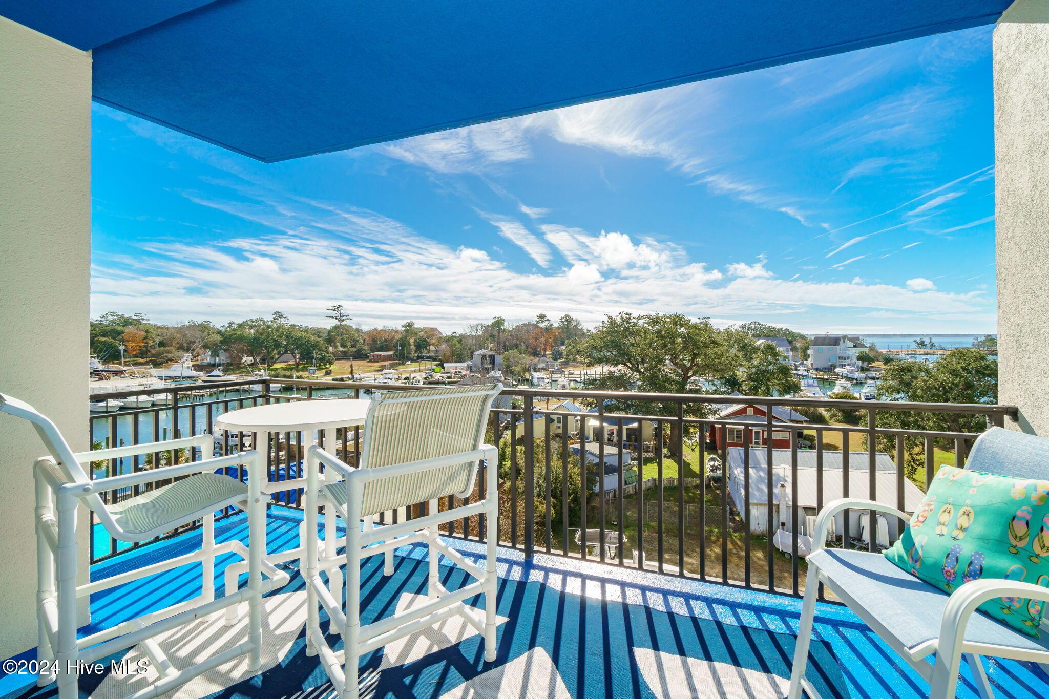 Image 3: Covered porch w/ great water views