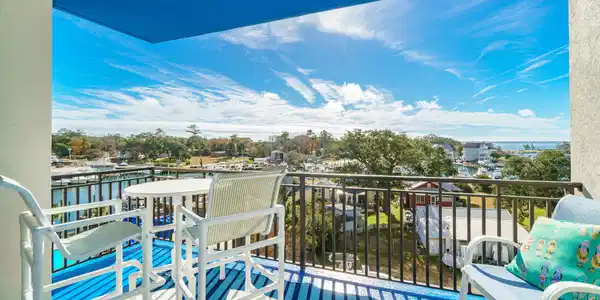 Image 3: Covered porch w/ great water views
