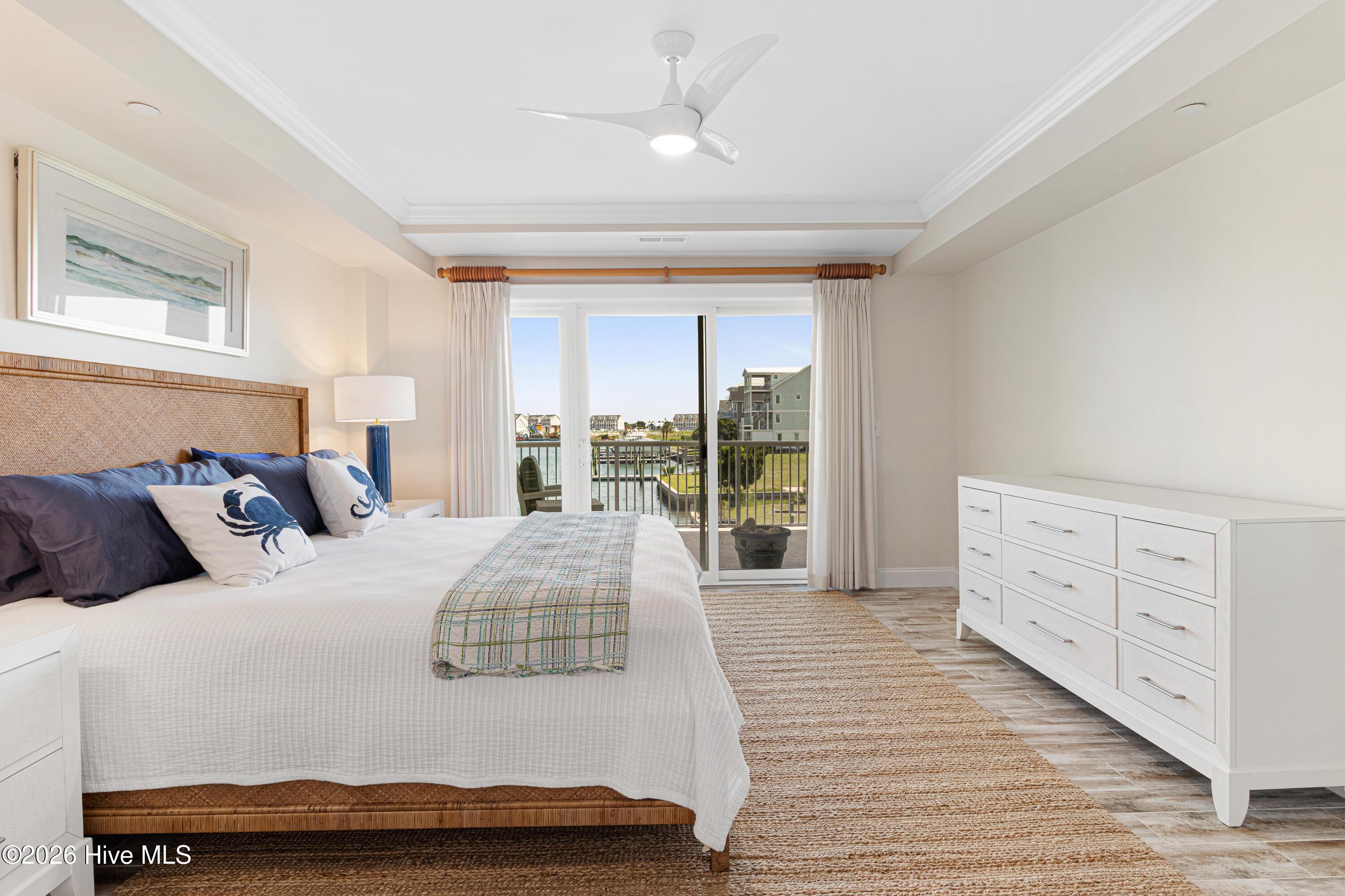 Image 4: Primary suite with water views