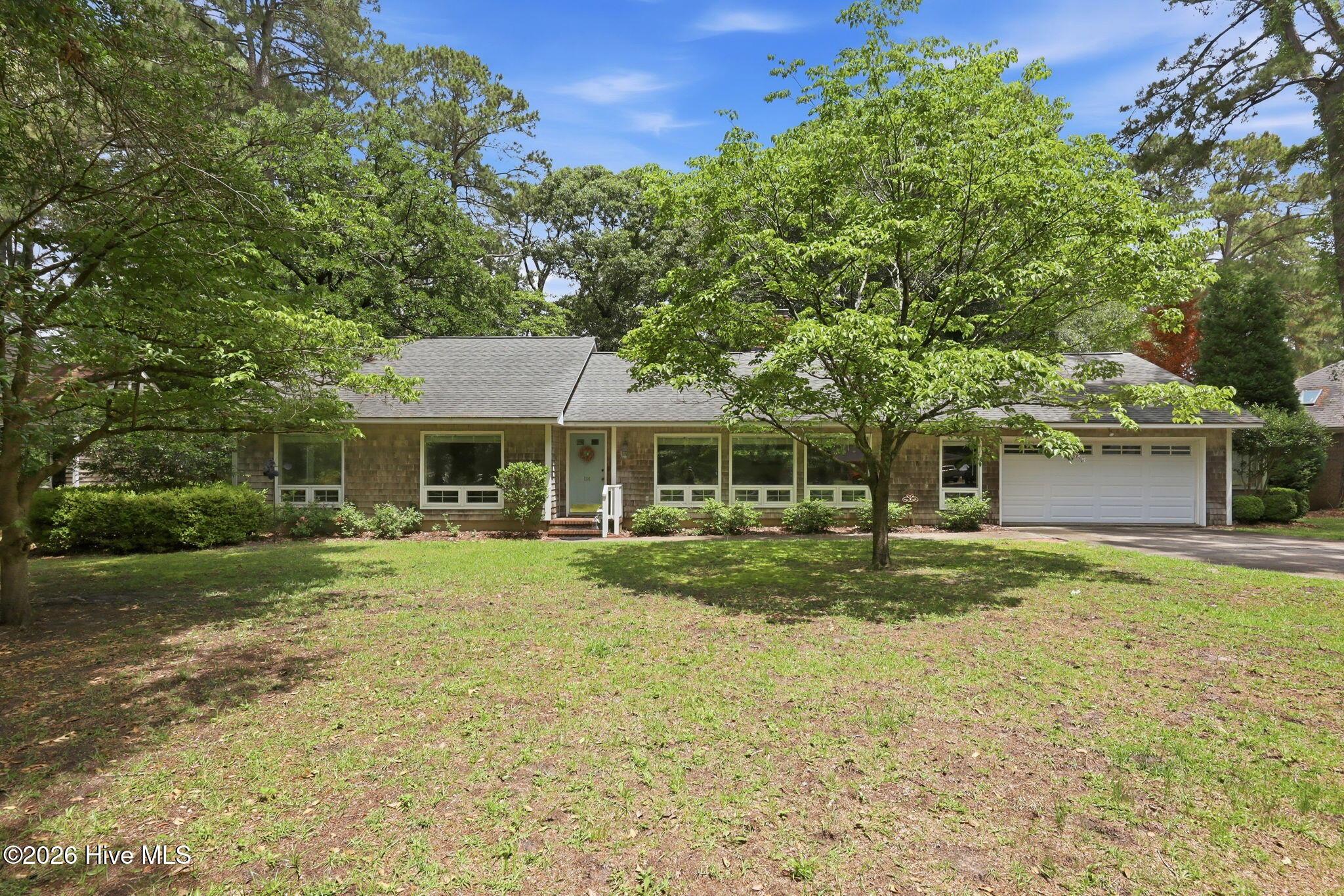 Image 1: 114 E. Fairway Dr.