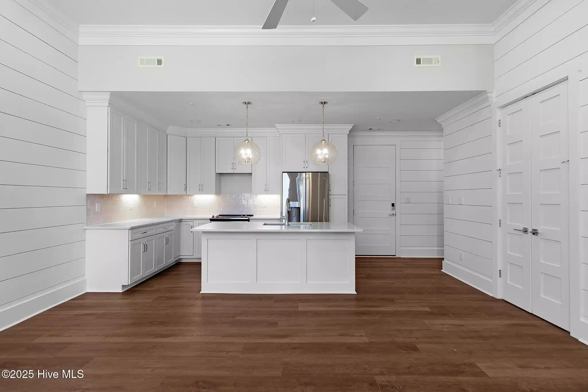 Image 1: Open Living, Kitchen, and Dining