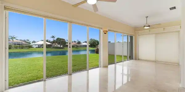 Image 2: Family room looking out through sliding glass door