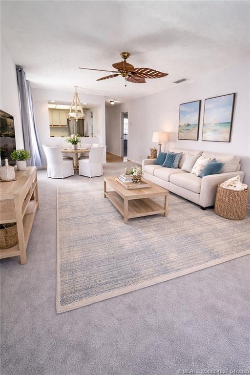 Image 3: Staged Living/dining