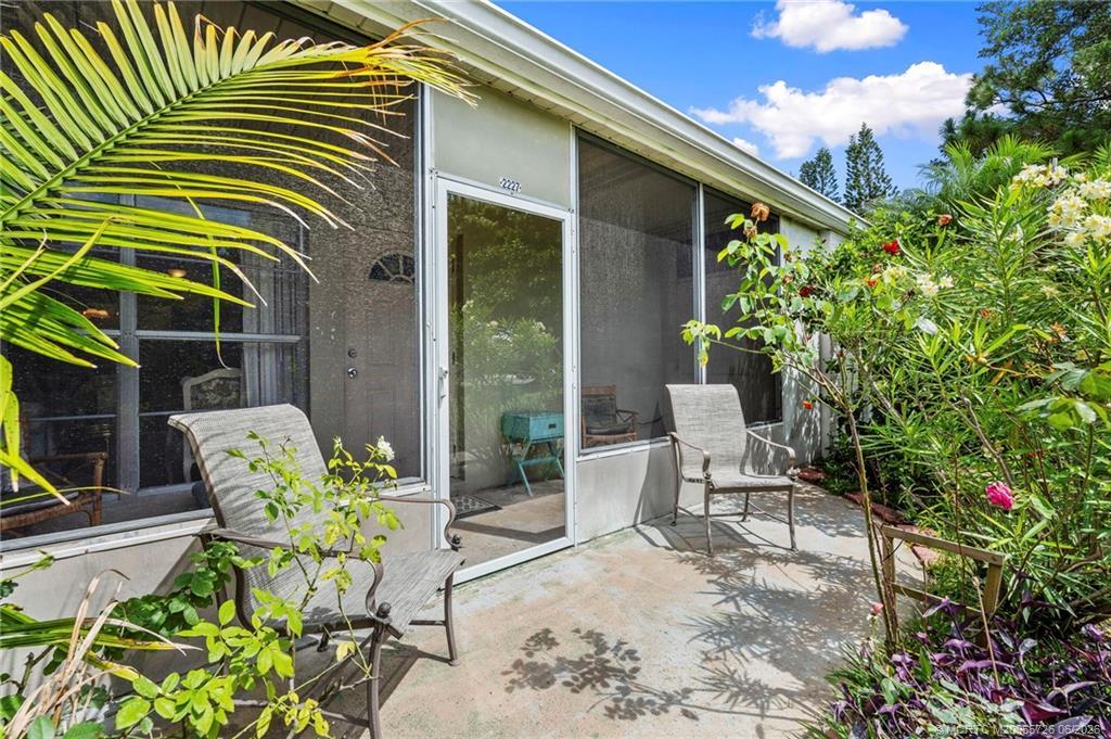 Image 3: Entry Way and Screened in Front Patio
