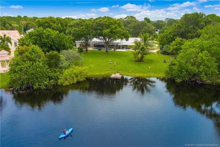 2980 NE Pinecrest Lakes Boulevard