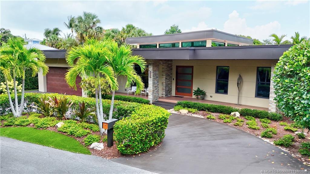 Image 3: Great curb appeal with circular drive and two-car