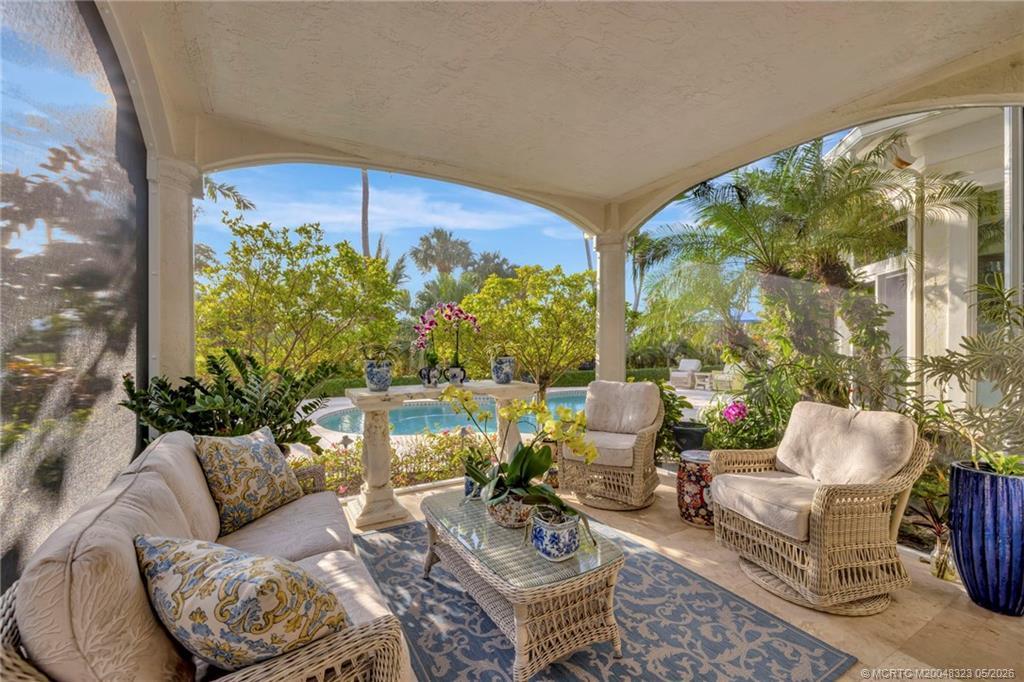 Image 2: Relax poolside with a good book surrounded by magi