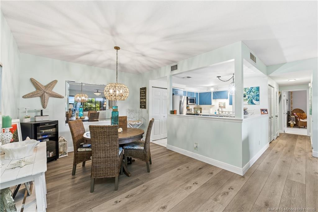 Image 3: Open concept with beautiful flooring