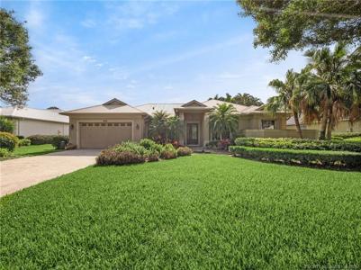 673 SW Whispering Palm Lane