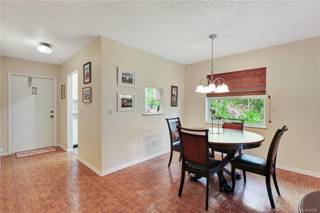 Image 4: Dining area window is impact glass.