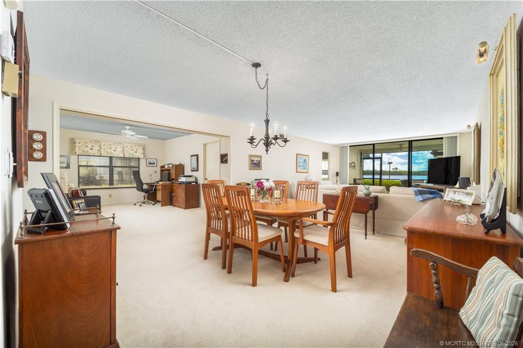 Image 3: Entry-Living-to patio. Left is open Den