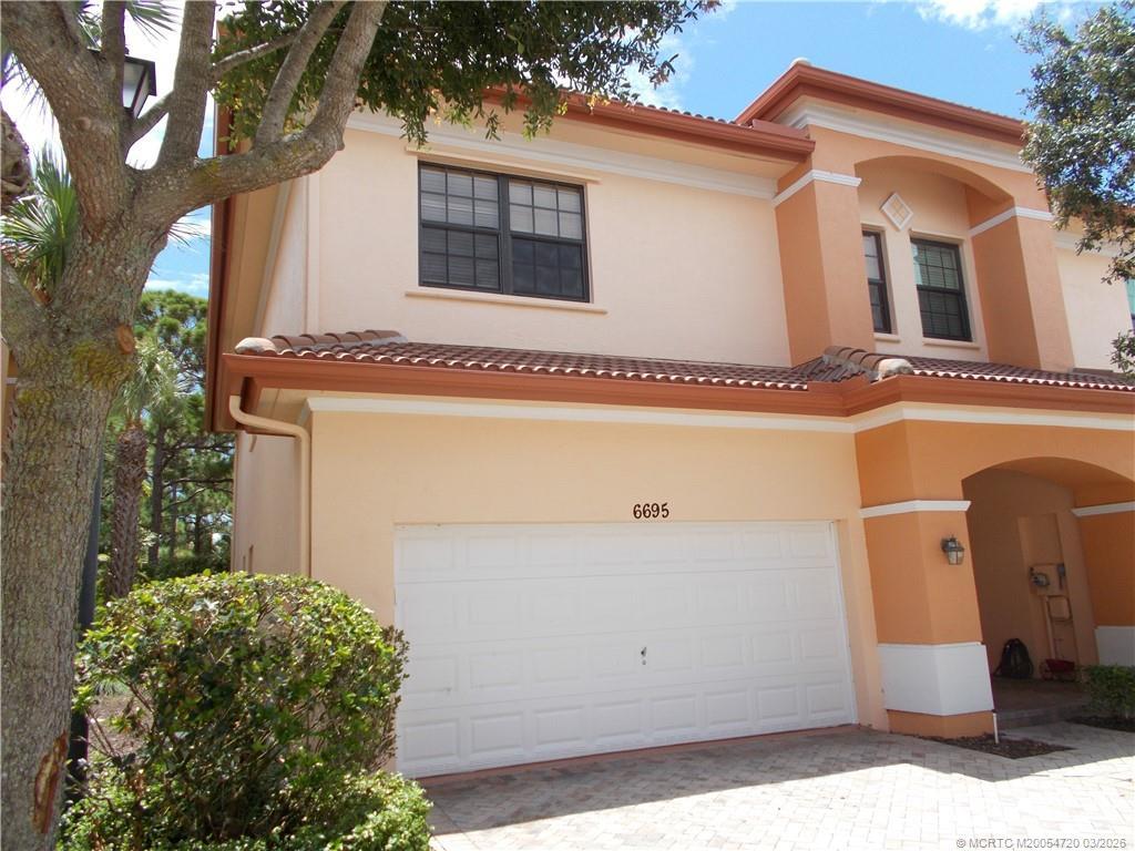 Image 2: Two car garage with new impact rated garage door