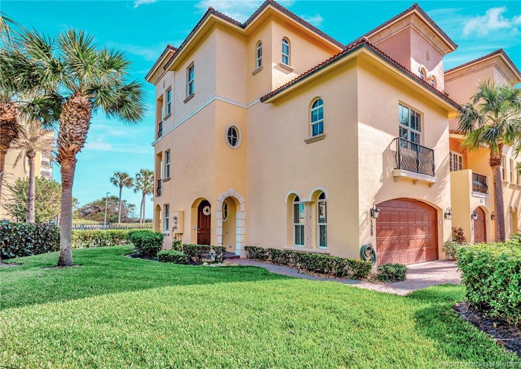 Image 2: beach, this 3-story, 3 bed, 3 bath townhome featur