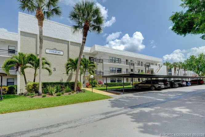 Image 4: Building 3, Elevator and Covered Parking.