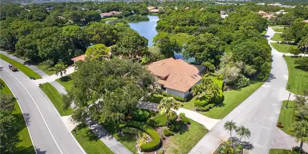 Image 3: Aerial of Home on Corner Lot