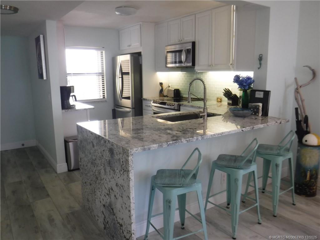Image 2: Kitchen with river view